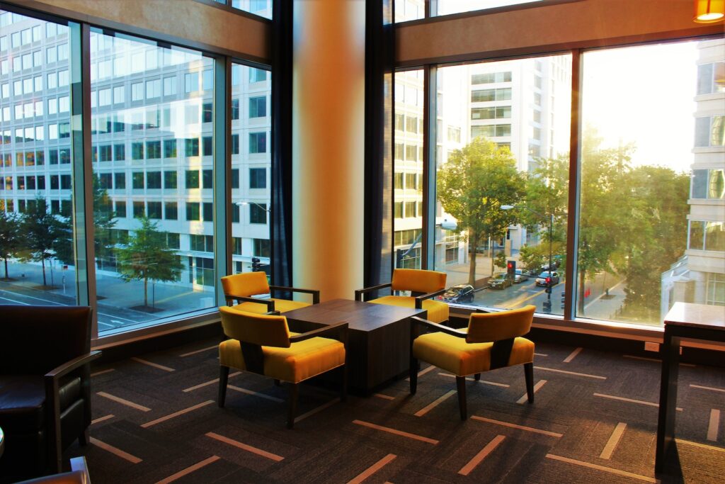 Brown Coffee Table Surrounded by Four Chairs